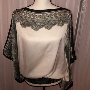 White and black paisley print. Bat wing sleeves